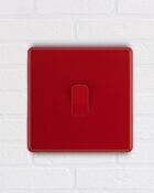 Arlec Fusion Cherry Red light switch on wall