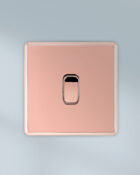 Rose G old Arlec Fusion single light switch on wall