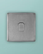 Stainless Steel Arlec Fusion single switch on wall