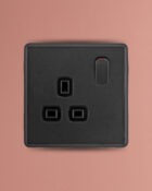 Charcoal Grey Arlec Rocker Plug Socket lifestyle