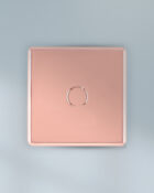 Rose Gold Arlec Fusion single dimmer switch on wall